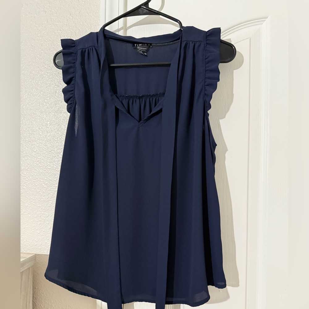 Timing Navy Ruffle Sleeveless Blouse